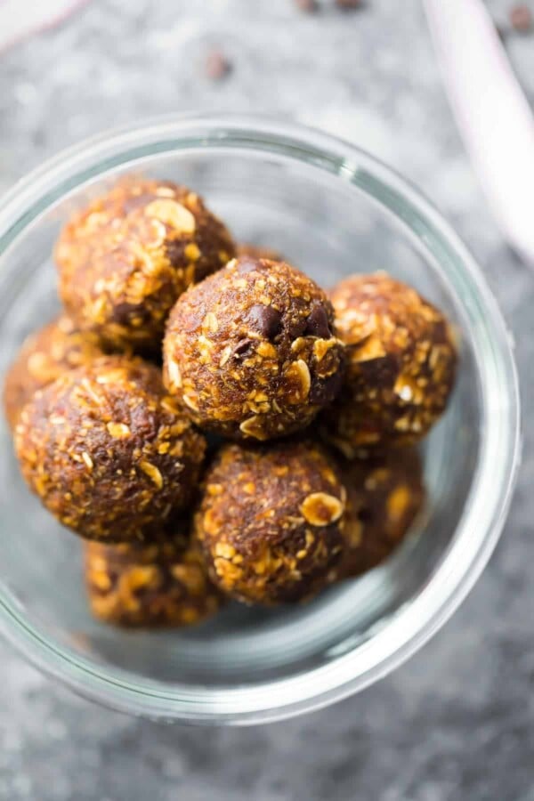 Overhead shot of Gingerbread chocolate chip energy bites in a glass bowl