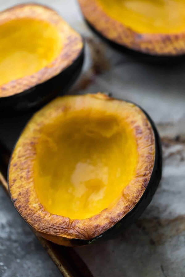 Three acorn squash halves