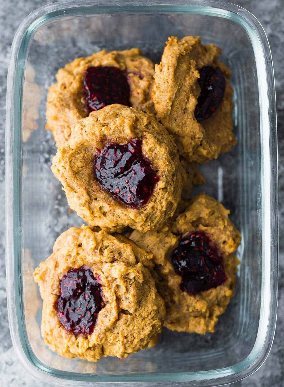 peanut butter and jam breakfast cookies in glass container
