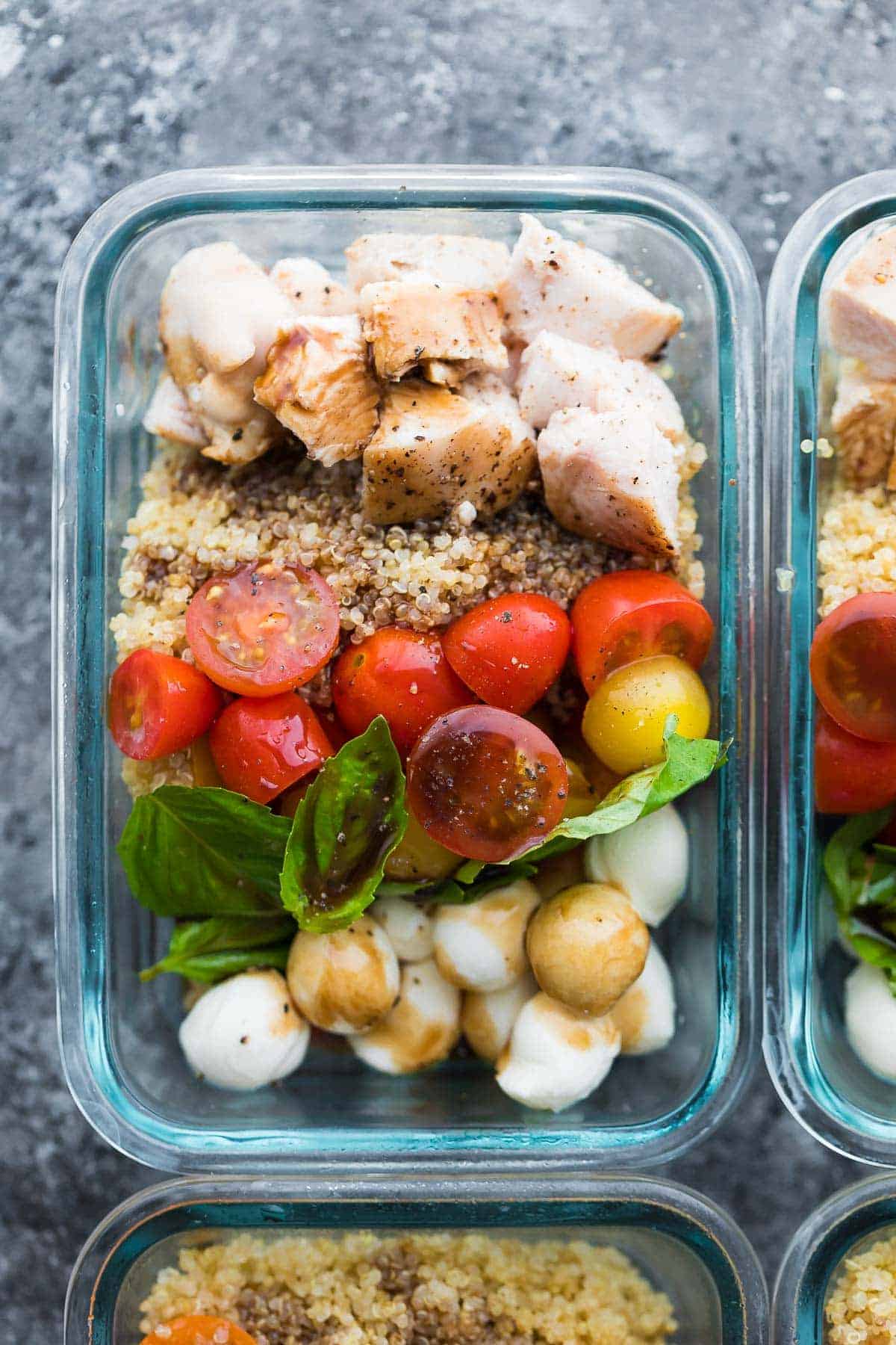 overhead shot of Make Ahead Caprese Salad Meal Prep Bowls in glass container