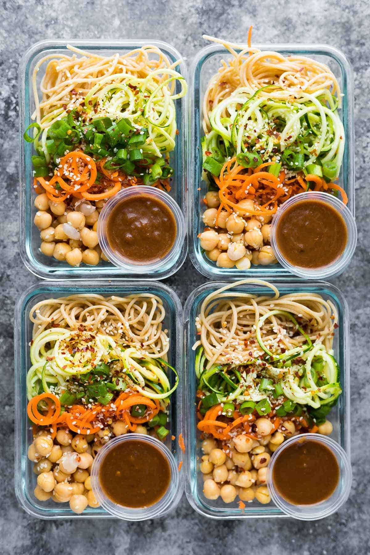 overhead shot of four Cold Sesame Noodle Meal Prep Bowls