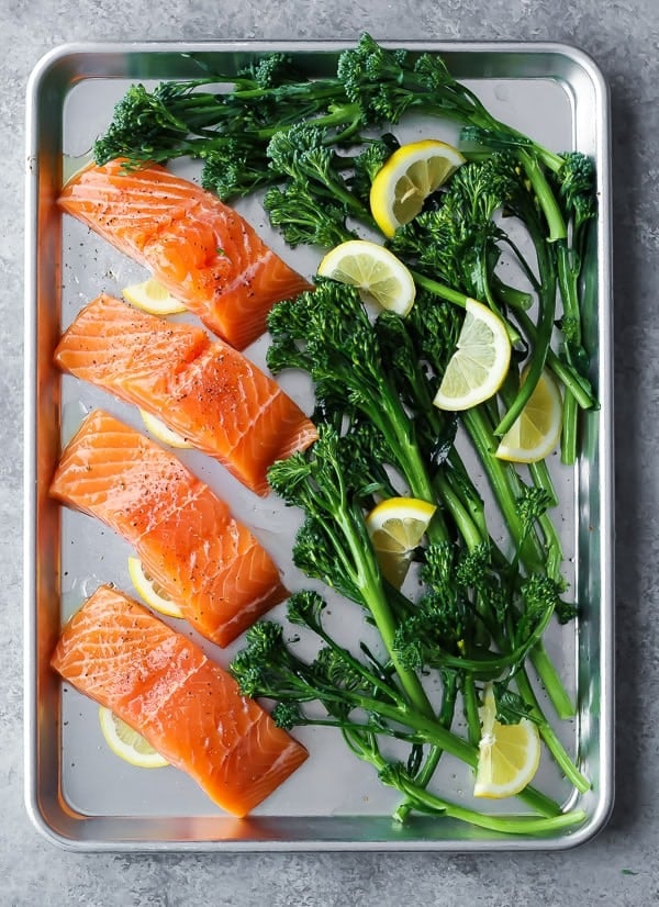 Sheet Pan Honey Lemon Salmon & Broccolini ingredients on sheet pan before baking