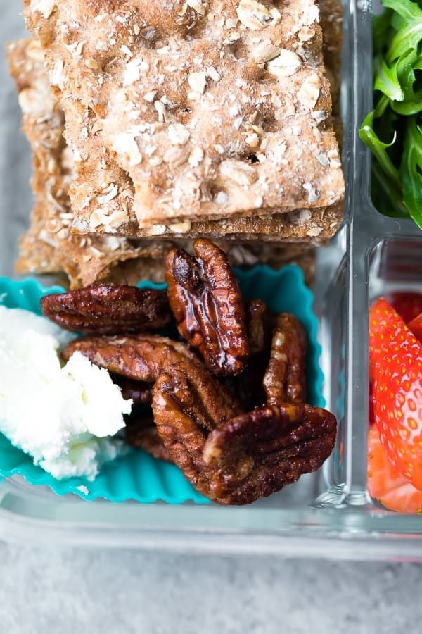 close up shot of the crackers and walnuts in the Spring strawberry bento lunch box