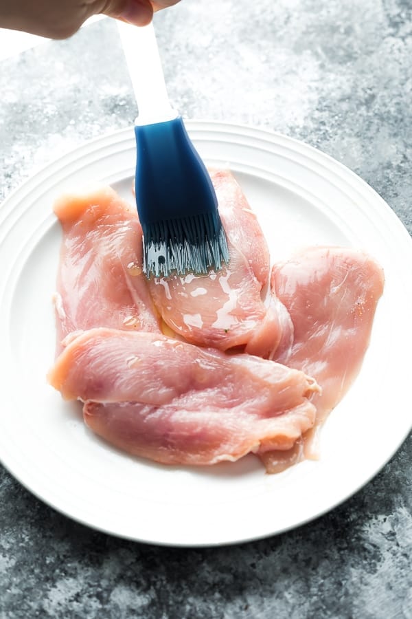 brushing chicken with olive oil prior to air frying them