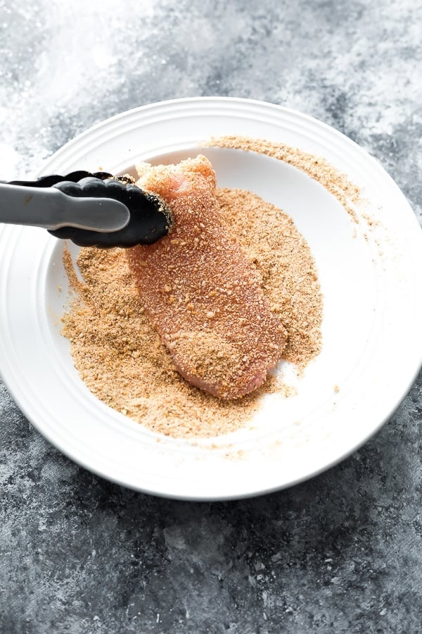 dredging the air fryer chicken breast recipes in the breading