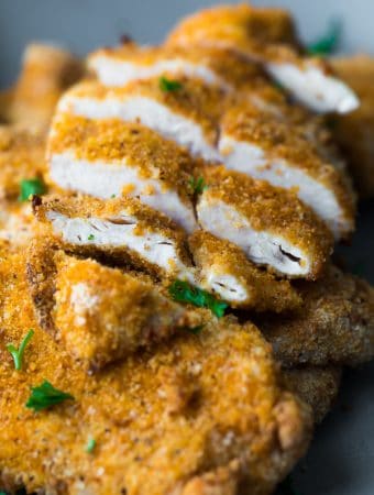 pile or air fryer chicken breasts with one sliced