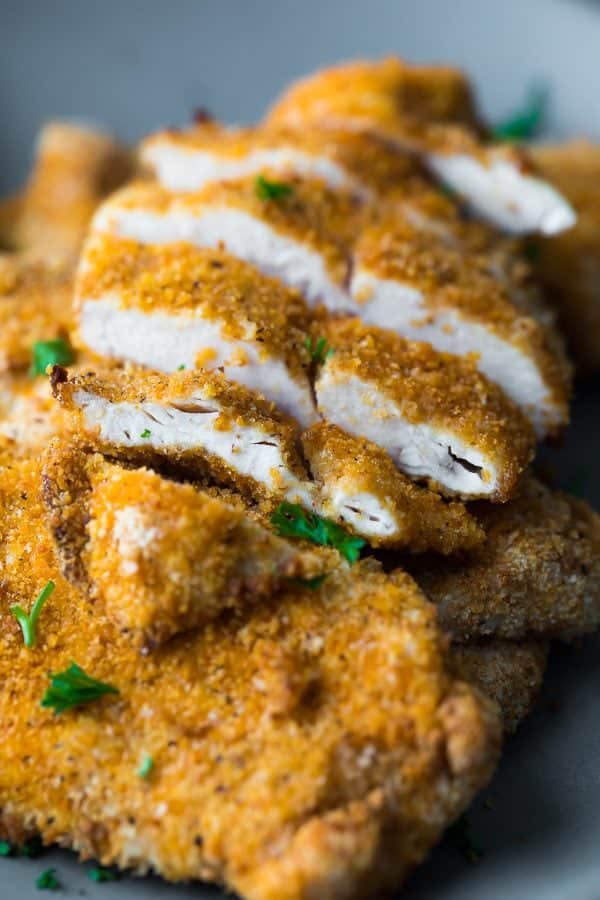 pile or air fryer chicken breasts with one sliced