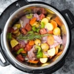 overhead shot of tuscan chicken stew ingredients in the crockpot