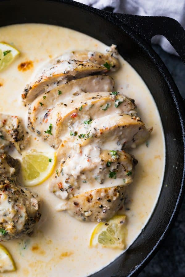 overhead shot of lemon garlic chicken breasts in the instant pot with lemon slices