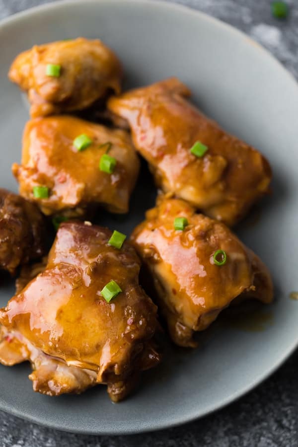 Sticky Slow Cooker Honey Garlic Chicken Thighs on a plate