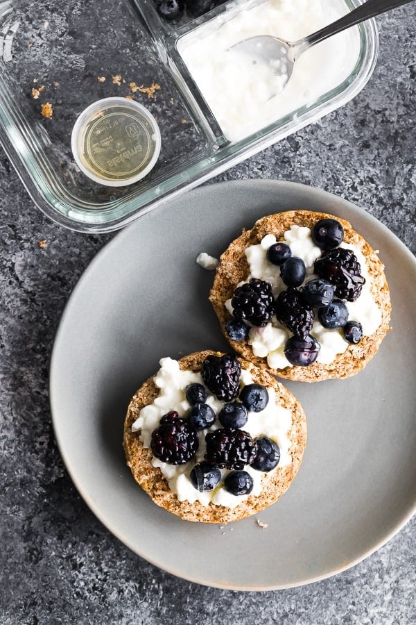 english muffin topped with cottage cheese and berries