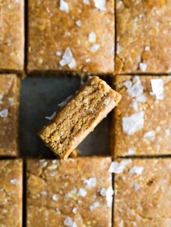 overhead shot of homemade protein bars cut into squares with one on its side