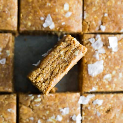 overhead shot of homemade protein bars cut into squares with one on its side
