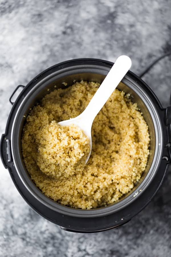 overhead view of cooked quinoa in a rice cooker
