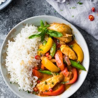 overhead view of Instant Pot Thai Chicken Curry in a bowl with rice