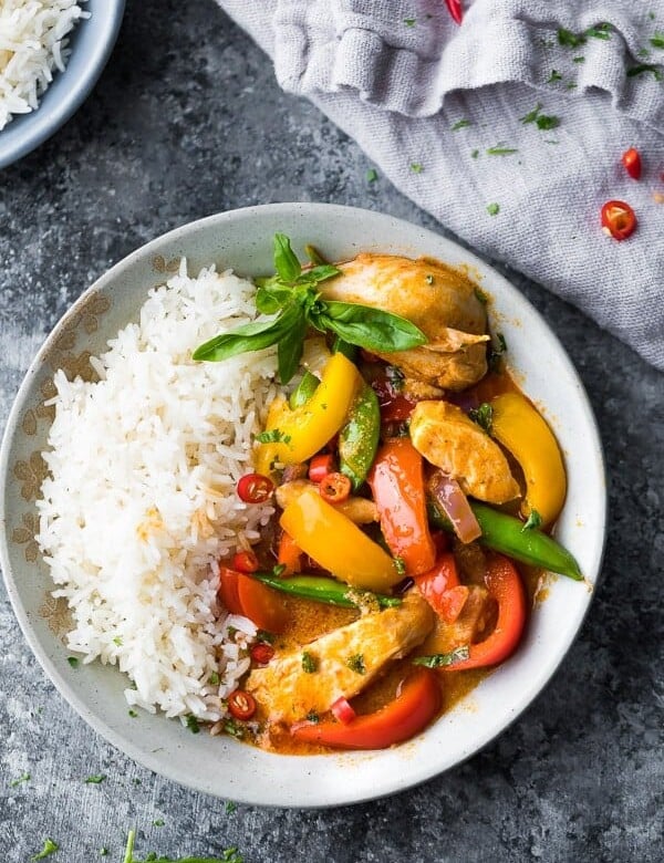 overhead view of Instant Pot Thai Chicken Curry in a bowl with rice