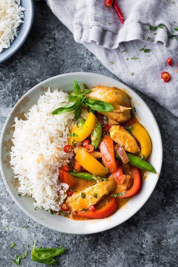 overhead view of Instant Pot Thai Chicken Curry in a bowl with rice