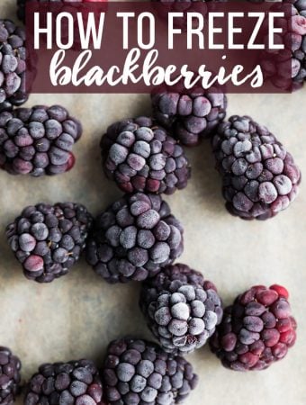 frozen blackberries on wood cutting board