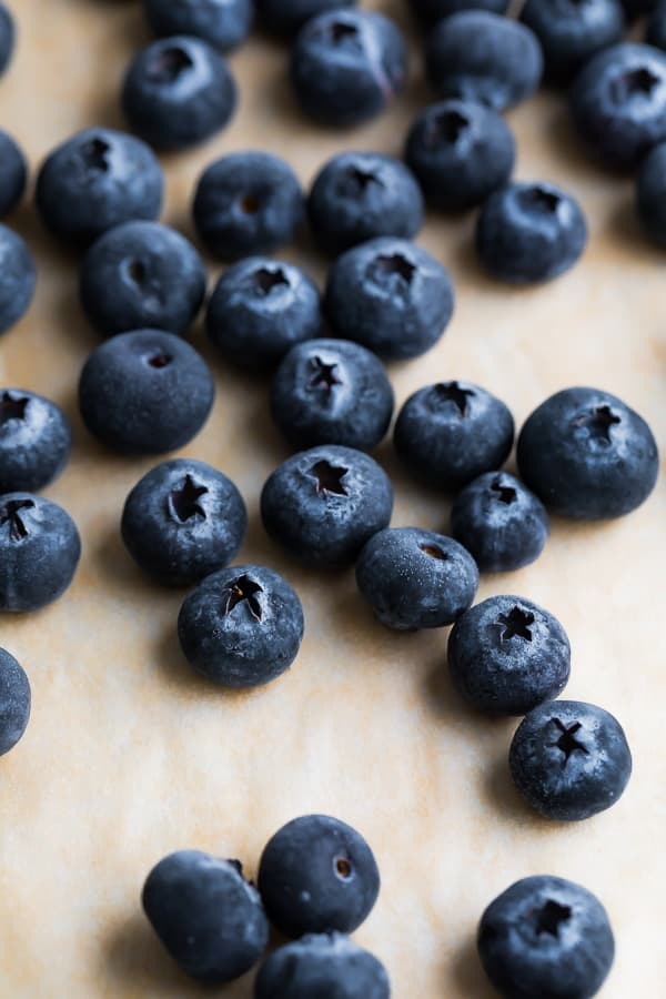 close up shot of blueberries on baking sheet