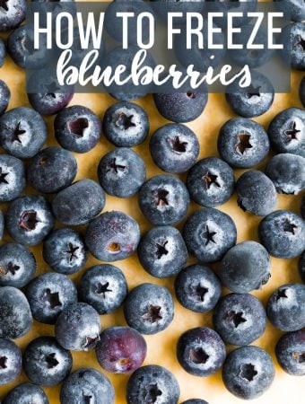 overhead shot of blueberries on wood cutting board