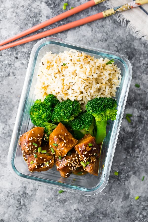 teriyaki chicken bowl in meal prep container with rice and broccoli
