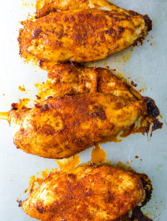 overhead shot of three perfect baked chicken breasts