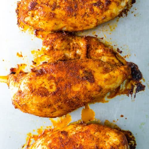 overhead shot of three perfect baked chicken breasts