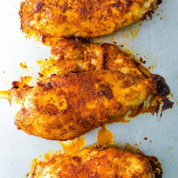 overhead shot of three perfect baked chicken breasts