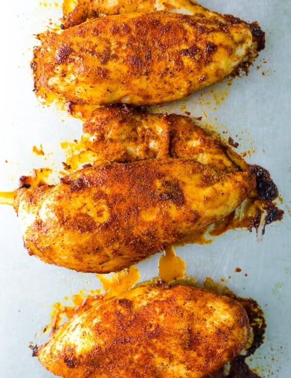 overhead shot of three perfect baked chicken breasts
