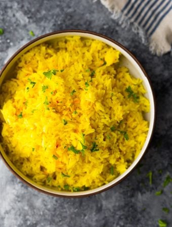 overhead shot of saffron rice in large bowl