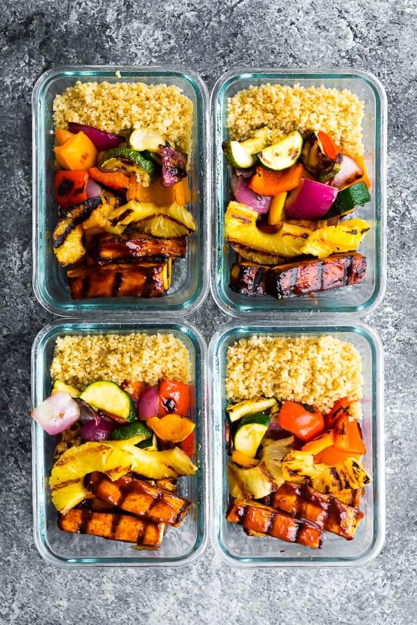 overhead shot of the Pineapple BBQ Tofu Bowls in meal prep containers