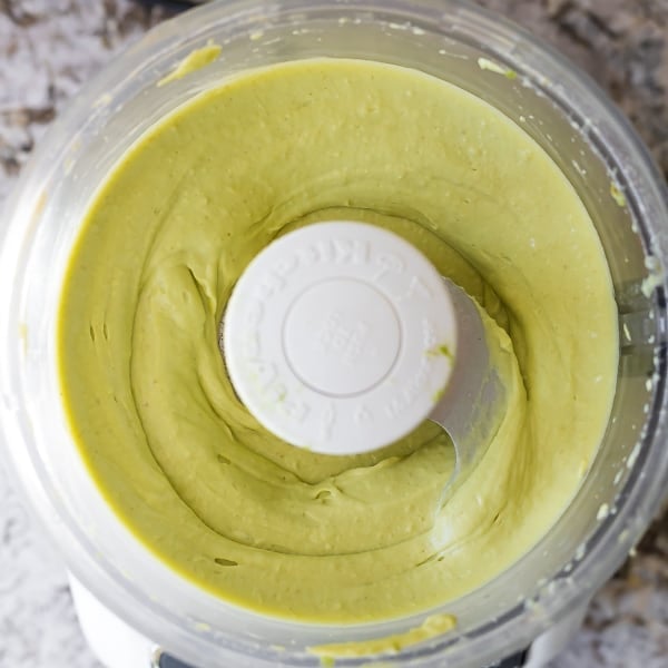 ingredients for Creamy Avocado Hummus in food processor (after processing)