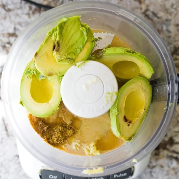 ingredients for Creamy Avocado Hummus in food processor (before processing)