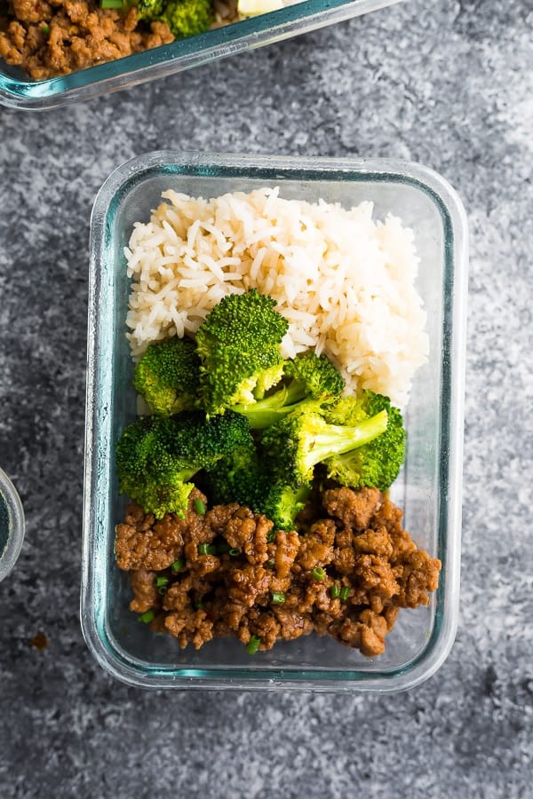 overhead shot of korean turkey meal prep bowls in glass container