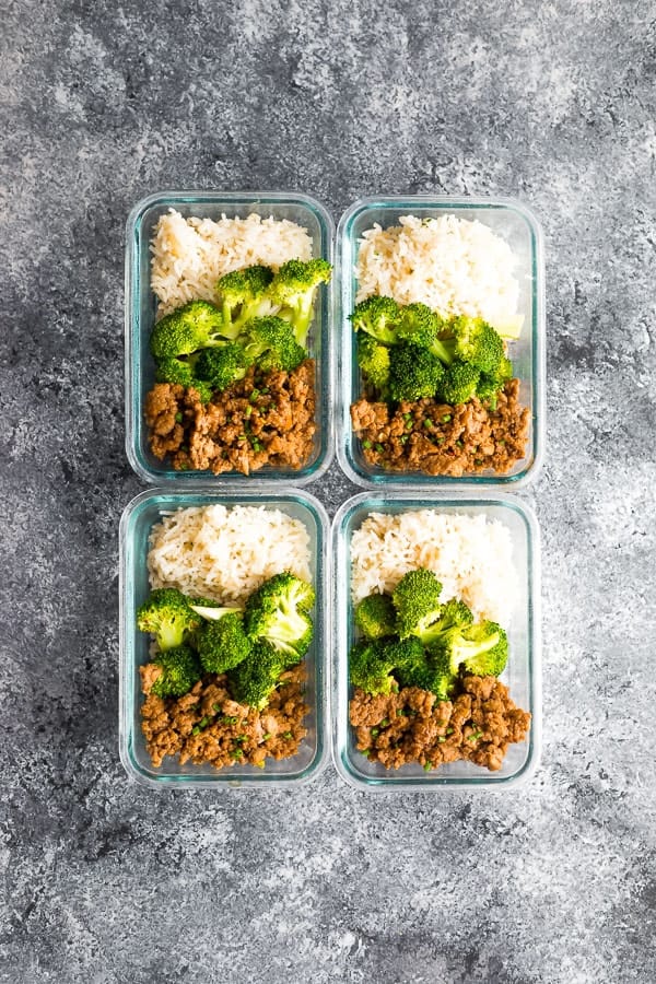 Korean Turkey Meal Prep in four glass meal prep containers on grey background