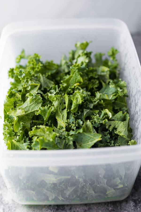 kale in produce saver prepped and ready for the massaged kale salad recipe