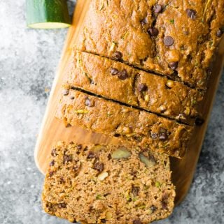 overhead view of the healthy zucchini bread recipe, sliced on a cutting board