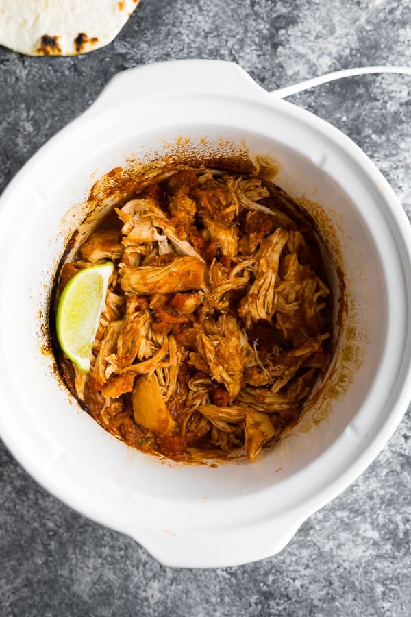 slow cooker salsa chicken in crock pot after cooking