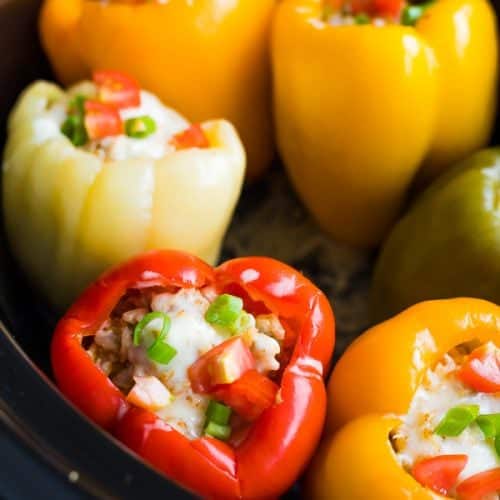 close up shot of stuffed peppers in crock pot