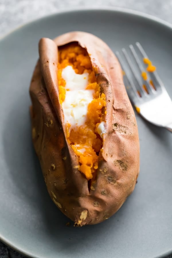 how to bake sweet potatoes- baked sweet potato with melted butter