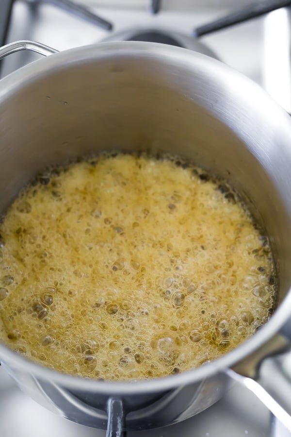 simmering the coconut oil, honey and almond butter for the Snickerdoodle Almond Butter Granola Bars