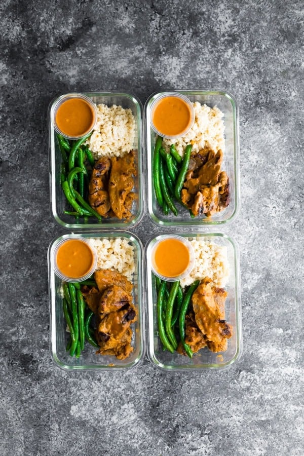 four low carb satay beef meal prep containers