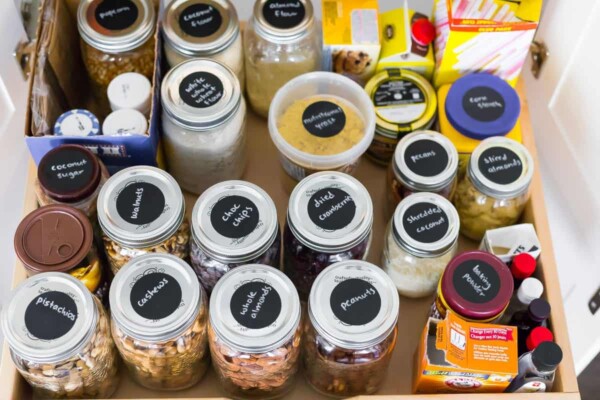 organized pantry with labeled jars