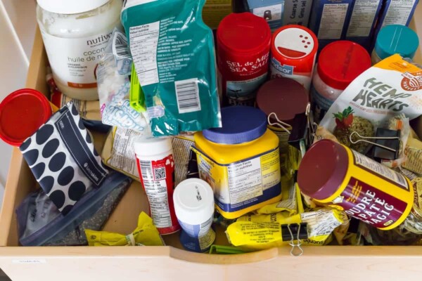 close up shot of many seasonings and foods in pantry