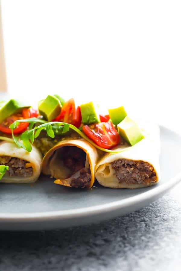 side view of ground beef taquitos