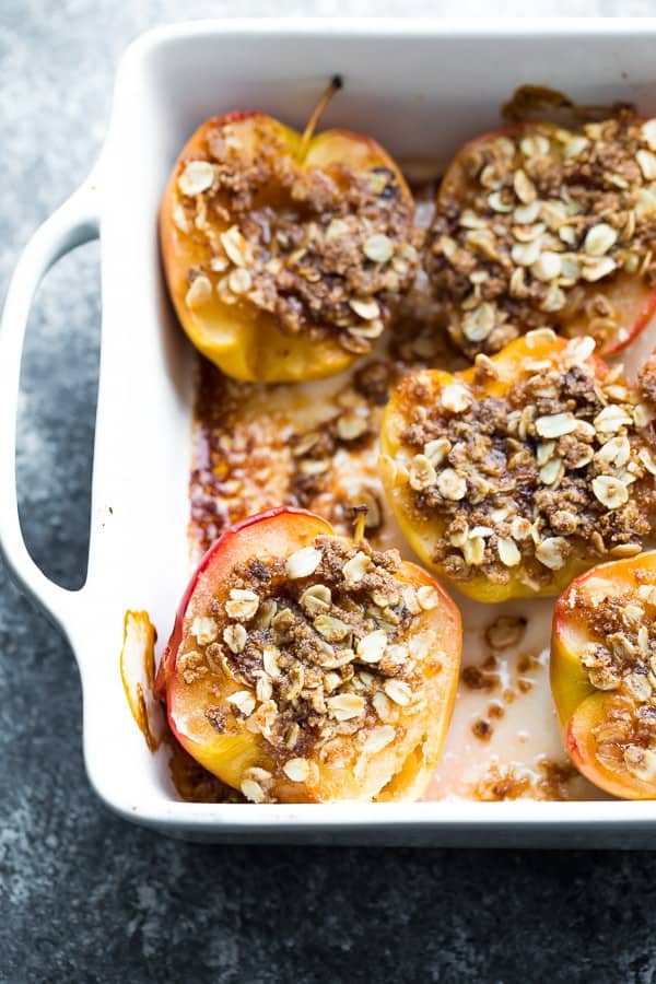 overhead shot of baked apples in white baking dish