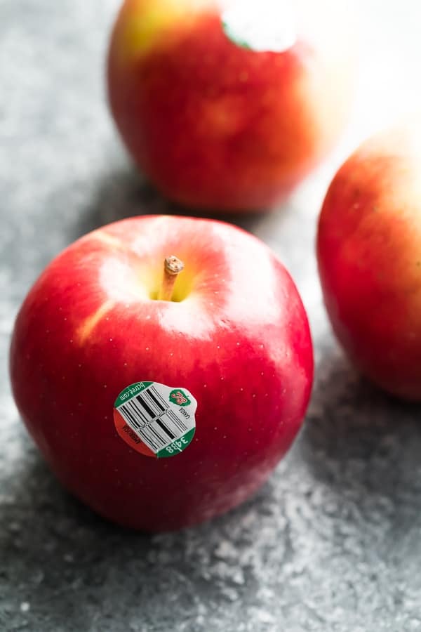 close up shot of apples with bc tree fruit sticker to be used in baked apple recipe