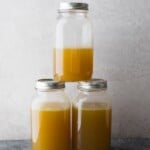 glass mason jars filled with turkey stock