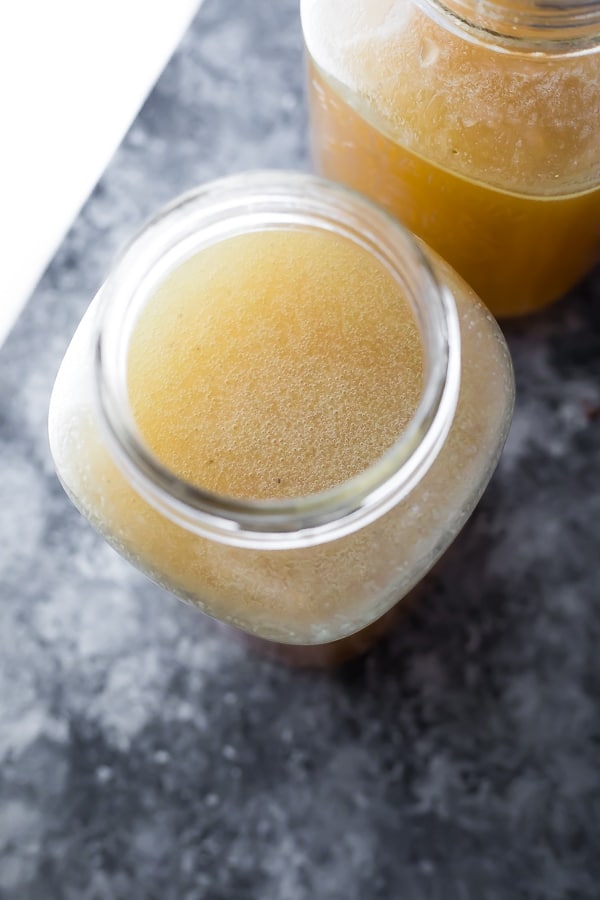 overhead view of turkey carcass stock in jar