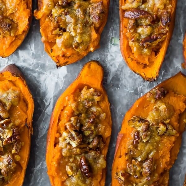 overhead shot of twice baked sweet potatoes in a row on parchment